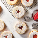 Cardamom cream cream linzer cookies on cooling rack