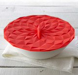 10 inch red suction lid on a white bowl.