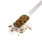 Za'atar in a measuring spoon