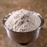 100% Organic Whole Wheat Flour in a bowl