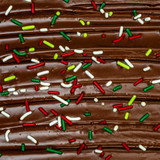 Supernatural Christmas Softies Sprinkles on chocolate cake.
