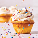 Vanilla cupcake decorated with Rainbow Softies Sprinkles