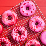 Buttermilk doughnut mix made in the standard doughnut pan. Topped with red and pink melting morsels.