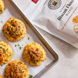 Cheddar garlic biscuits on a page made with Buttermilk Biscuit Flour Blend