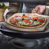 Pizza being cooked on Emile Henry Pizza Station