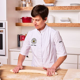 Instructor Amber Eisler forming baguettes