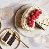 Chocolate cake with vanilla frosting and raspberries on top Deliciously Simple Chocolate Cake Mix