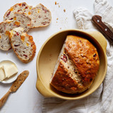 Apricot cran-pecan bread baked in the bread baking bowl.