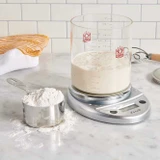 Essential Digital Scale weighting sourdough in glass sourdough crock