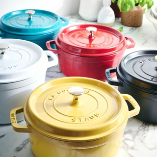 Staub 4 QT Dutch Oven in white, matte black, turquoise, cherry, and citron