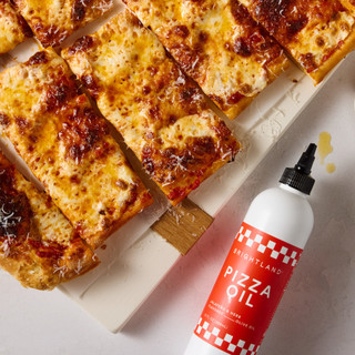 Brightland Pizza Oil with pizza