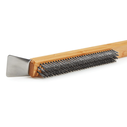 Stainless steel scraper on the top end with stainless steel bristle. Tan bamboo handle. View of bristles and scraper