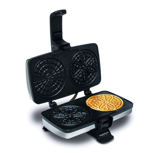Pizzelle Iron with pizzelle cooking in it