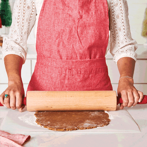 Rolling out gingerbread and using pop out cutters