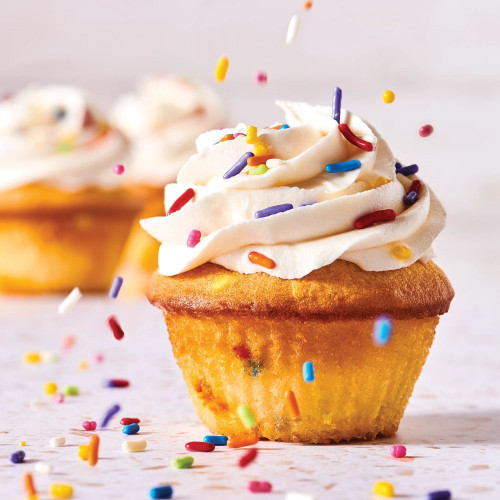 Vanilla cupcake decorated with Rainbow Softies Sprinkles