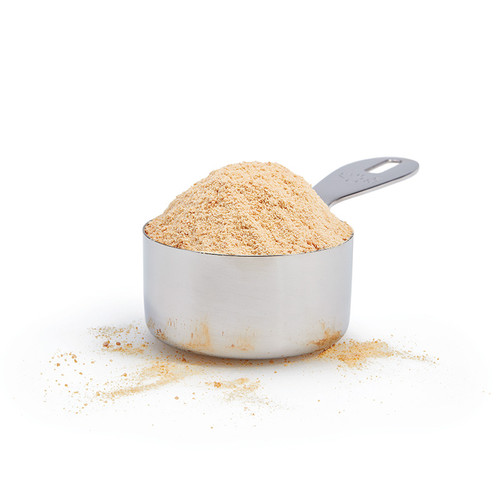 Pure Maple Sugar in stainless steel measuring cup