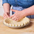 Instructor Erin Jeanne McDowell forming a pie crust