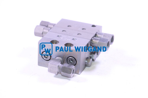 Bloque distribuidor Faun Variopress progresivo 3/6 (01027727)