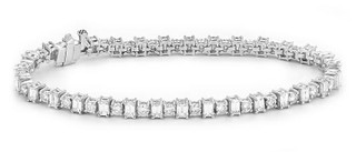 A classic blend of modern and old style diamond bracelet set with Baguettes and Round cut diamonds.