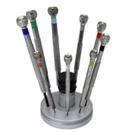 9 piece watch and jewelry screwdriver set on metal base