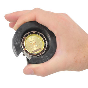 Hand-operated rubber watch bezel remover made to fit revolving bezels