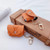 LV Faux Wood Orange Keychain Purse Airpod Case