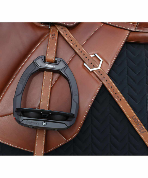 Image of Flex-On Safe on stirrup iron on saddle.