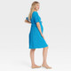 Short Sleeve Plisse Mini Maternity Empire Waist Dress - Isabel Maternity by Ingrid & Isabel Blue XS