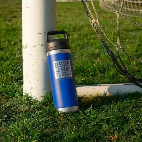 Royal Blue Chug Cap Water Bottle Lifestyle with Goal Post
