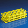 Yellow polypropylene snap-together test tube rack with 90 grid spaces, shown at an angle on a blue surface.