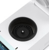 A high-angle view of the open white centrifuge, showing the black rotor with 24 tube slots.
