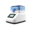 White 4E's Scientific bead mill homogenizer with blue accents and transparent lid, angled view against black.
