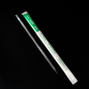 NEST 2mL sterile serological pipette next to its green and white plastic wrapper.