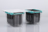 Two blister packs of black conductive robotic pipette tips on a white background.