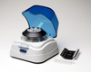 Labnet white and blue mini microcentrifuge with open lid, containing microcentrifuge tubes, with extra rotor and PCR strip