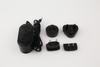 Black power adapter with four interchangeable international plug adapters on white.