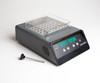 Gray Labnet digital dry bath incubator with single aluminum block, clear lid, digital control panel, and probe on white