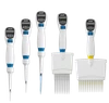 Five Labnet Excel electronic pipettors in single- and multi-channel configurations against a black background.
