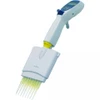 Labnet Excel 8-channel electronic pipettor with yellow tips, angled view against a white background.