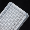 Transparent 96 deepwell plate at an angle showing square wells and alphanumeric grid labels.