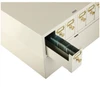 Beige metal slide storage cabinet with an open drawer revealing rows of microscope slides and brass knobs.