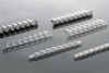 Several clear and white 0.2 mL plastic PCR 8-strip tubes displayed at angles on a surface.