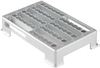 Silver aluminum rack with four parallel channels and vertical legs for laboratory sample processing.