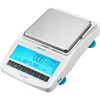 White Adam Polaris precision balance with stainless steel pan and blue backlit graphic display.