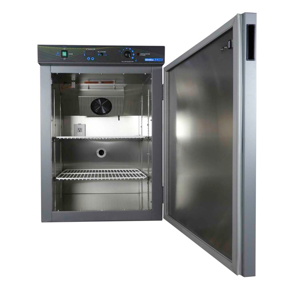 SHEL LAB refrigerated incubator with open door, showing aluminum interior and two wire shelves.
