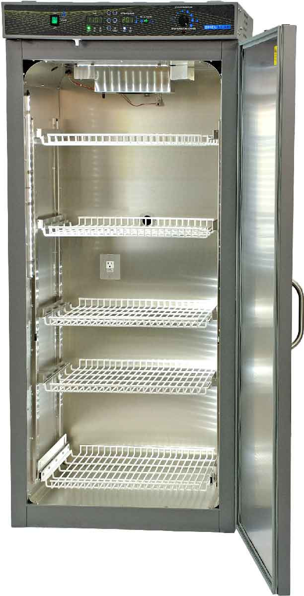 Front view of a gray Sheldon Manufacturing incubator with its door open, revealing five wire shelves.