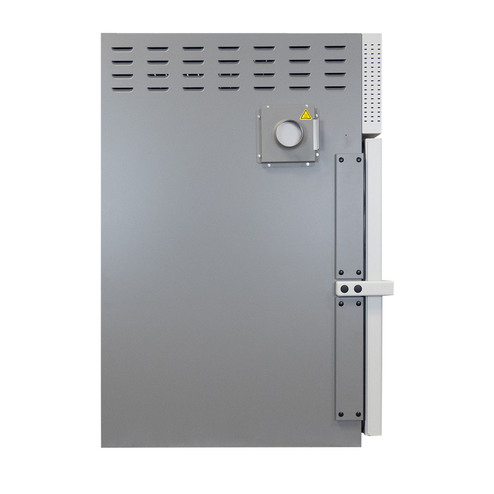 Front view of a grey industrial forced-air oven with a metal latch and top ventilation slots.