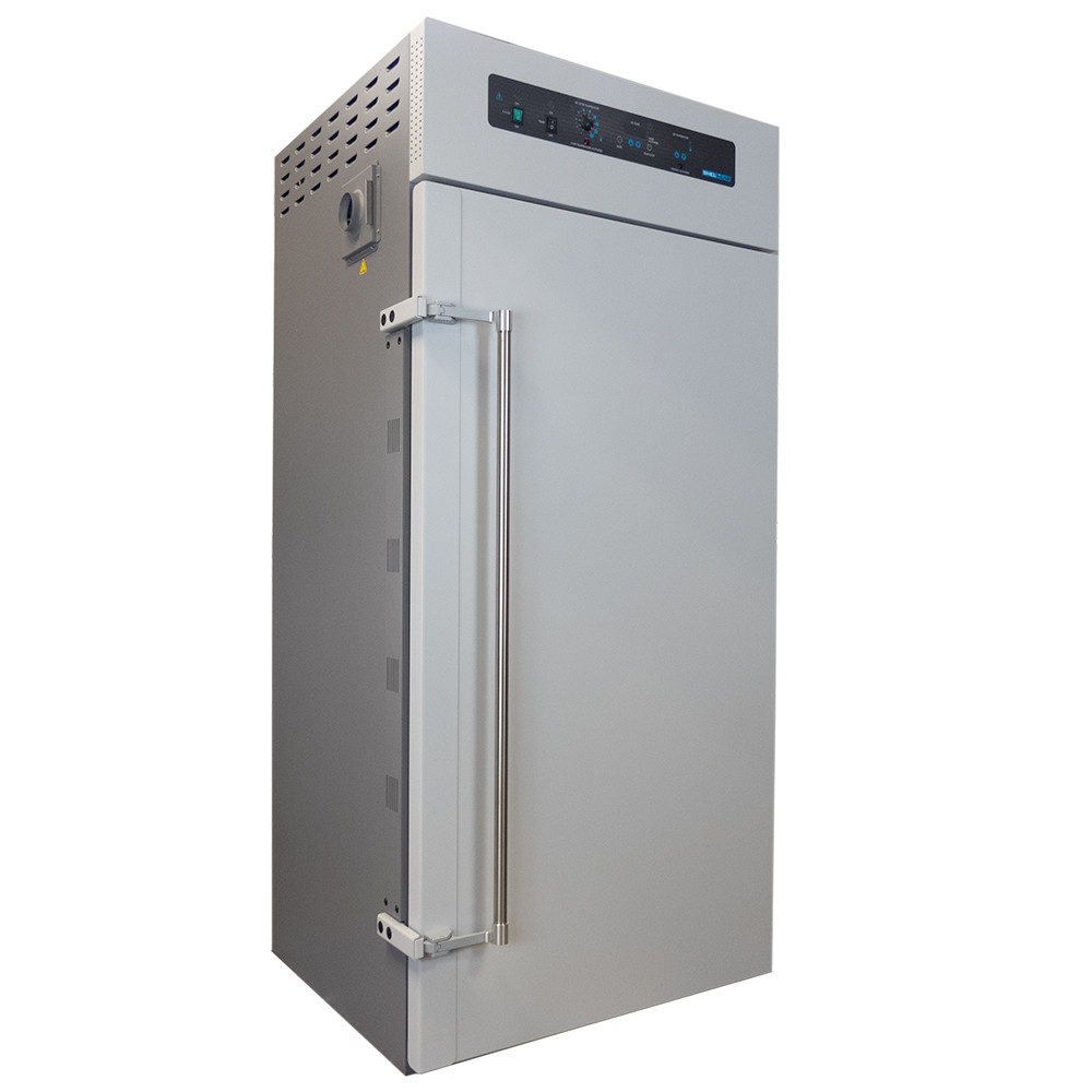 A large grey Sheldon Manufacturing forced-air oven with a vertical door, long metal handle, and top control panel.