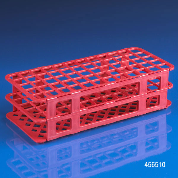 Red plastic 60-place snap-together tube rack with three tiers viewed at an angle on a blue surface.