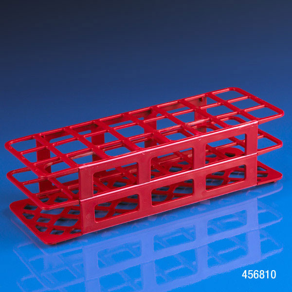 Red polypropylene 24-place snap-together tube rack viewed from a low angle.